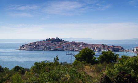 Primosten, Croatia, 19 august 2019 panorama view with boats on sea. Old mediterranean travel destination and vacation in sunny day.の写真素材