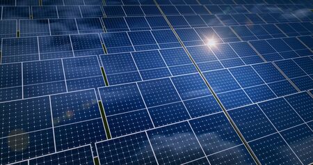 Solar energy panels with sun reflection and blue sky in background. Green power, ecology, clean and...