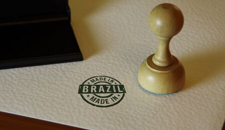Made in Brazil stamp and stamping hand. Factory, manufacturing and production country concept.の写真素材