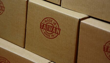 Made in Taiwan stamp printed on cardboard box. Factory, manufacturing and production country concept.の写真素材