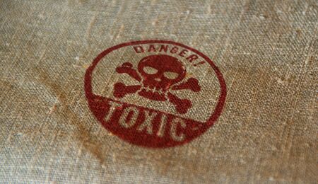 Toxic danger with skull stamp printed on linen sack. Poison warning concept.の写真素材