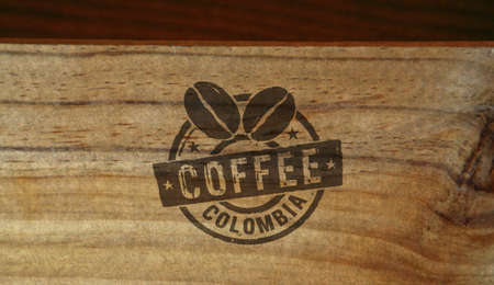 Coffee Colombia stamp printed on wooden box. Factory, manufacturing and production country concept.の写真素材