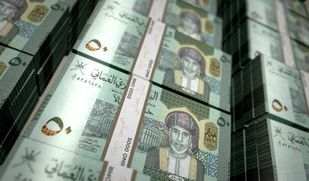 Oman Rial money pack 3d illustration. OMR banknote bundle stacks. Concept of finance, cash, economy crisis, business success, recession, bank, tax and debt.の写真素材