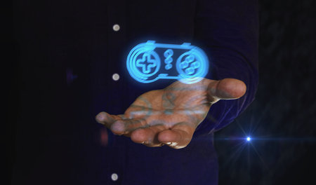 Esport retro video game pad and digital sport gaming symbol over hand digital concept. Cyber technology and computer background abstract 3d illustration.の写真素材