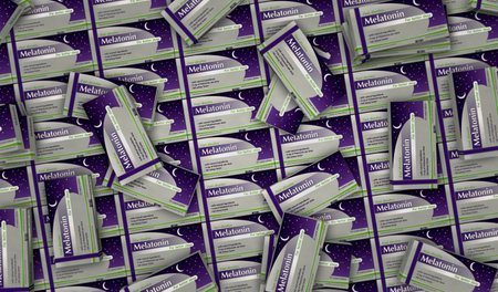 Melatonin tablets box production line. Medical sleeplessness help and insomnia remedy pills pack...