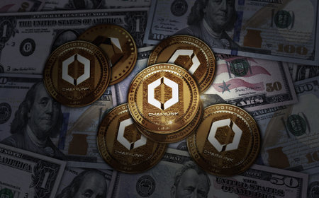 Chainlink LINK cryptocurrency golden coin over Dollar banknotes. Online payment and crypto money transaction abstract concept 3d illustration.の写真素材