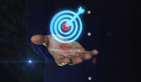 Target business strategy and success motivation 3d symbol over man hand. Cyber technology icon abstract concept 3d illustration.の写真素材