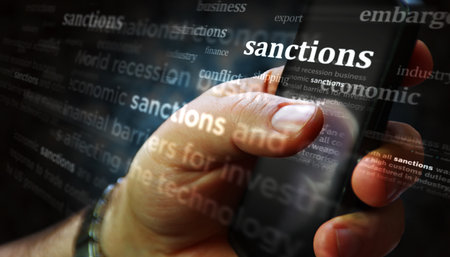 Sanctions economy and business trade embargo social media on display. Searching on tablet, pad, phone or smartphone screen in hand. Abstract concept of news titles 3d illustration.の写真素材