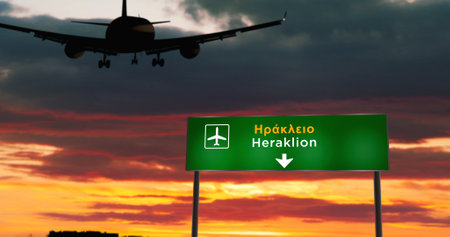 Airplane silhouette landing in Heraklion, Greece, Crete. City arrival with airport direction signboard and sunset in background. Trip and transportation concept 3d illustration.の写真素材