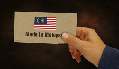 Made in Malaysia box. Malaysian manufacturing and delivery. Product factory, import and export. Abstract concept 3d illustration.の写真素材
