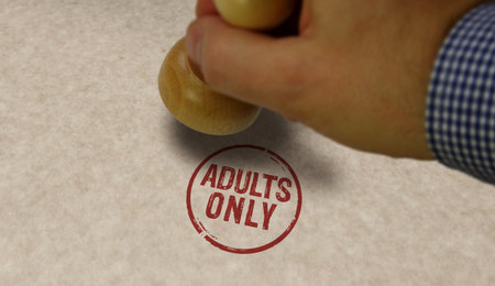 Adults only 18 plus age prohibition stamp and stamping hand. Under eighteen restricted concepts.の写真素材
