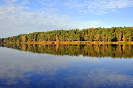 A quiet autumn on the lakeの写真素材