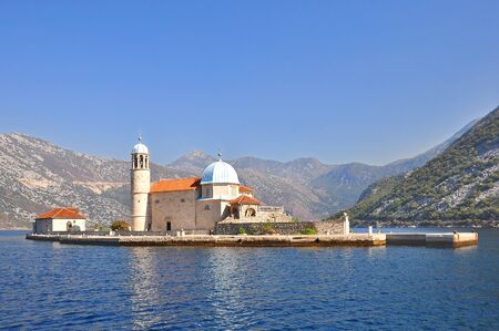 Small but spectacular Church of the virgin, located on the island of Gospa od Skrela, is a very unusual monument, which is located in the middle of the Boka Bay.の写真素材