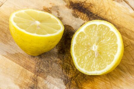Lemon with ice cubes in a bowl.の写真素材