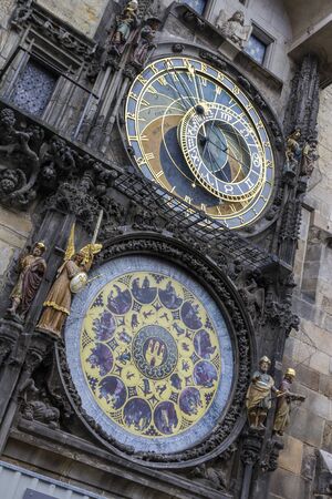 The famous medieval landmark of Prague, the Prague astronomical clock on an autumn day.の写真素材