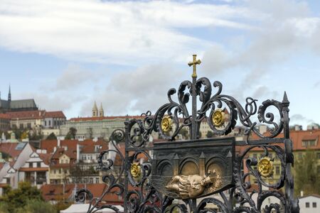 Statue on the Charles Bridge in Prague on an autumn day.のeditorial素材