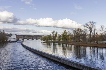 The famous Charles Bridge and the Vltava river in Prague on an autumn afternoon.の写真素材