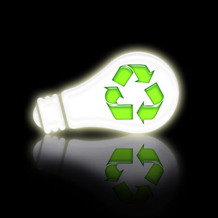 Saving lamp with green recycling symbol over black background with reflectionの写真素材