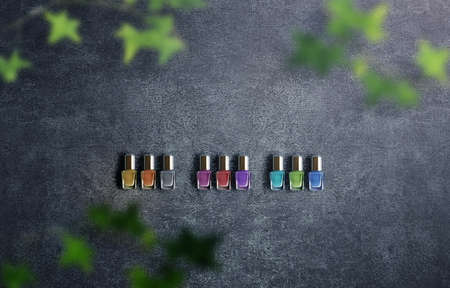 Colorful background photo of fashionable nail polish