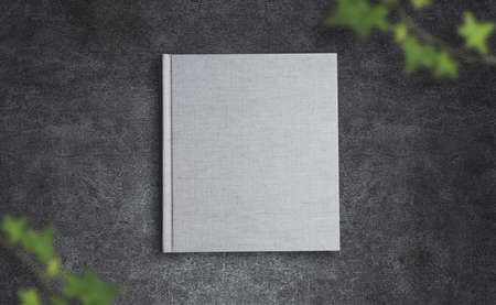 Concrete table and photo album bookletの写真素材