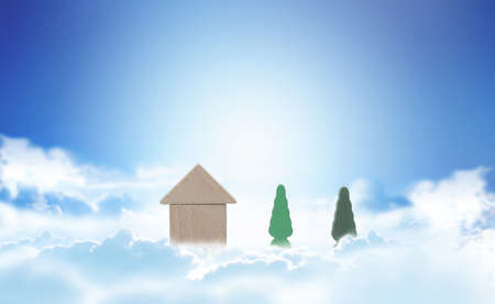 The house of the blue sky, the cloud, and the treeの写真素材