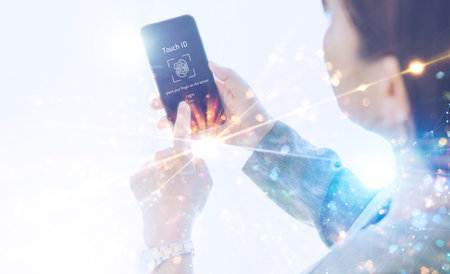 Business graphics of a woman with fingerprint authentication on a smartphone