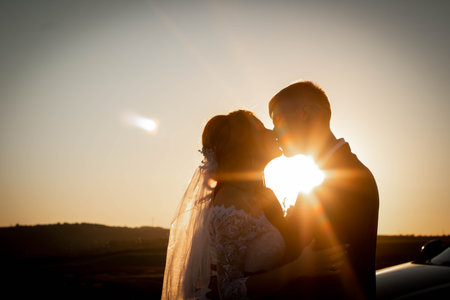 Groom Nevnsta, Wedding Kiss Sunsetの写真素材