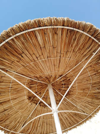 umbrella made of wood against the sky. Holidays. beachの写真素材