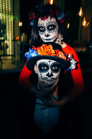 zombie couple in the dark outside, blurry lights, ghosts. day of the dead and halloween.