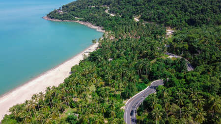 Aerial view of road and beach between Khanom and Sichon, Nakhon Si Thammarat, Thailandの写真素材