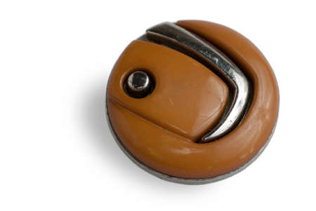 old brown button which was used