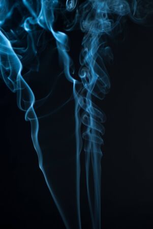 Beautiful smoke on the black background - macro photo.の写真素材