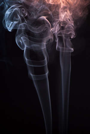 Beautiful smoke on the black background - macro photo.の写真素材