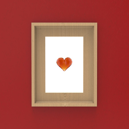 blank wooden frame on red wall with glass gem heart inside . 3d illustration mockup design.の写真素材