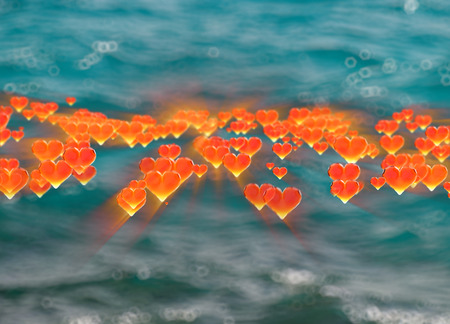 Red gem hearts isolated on blurred marine sea background. Geometric rumpled triangular low poly style graphic 3d render illustration.の写真素材