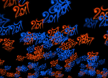 Happy new year 2017 flying digits numbers written with fire flame light on black background