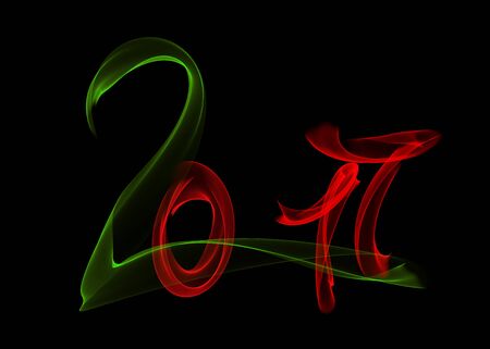 Happy new year 2017 isolated numbers lettering written with red and green fire flame or smoke on...