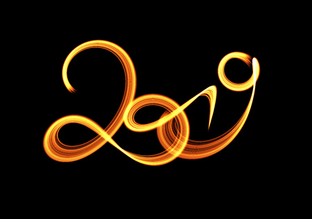 Happy new year 2019 isolated numbers lettering written with fire flame or smoke on black background