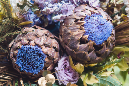 Bunch of fresh flowers in blue colors. Boho style closeup. Selective focus macro shot with shallow DOFの写真素材