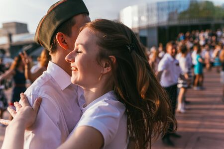 MOSCOW, RUSSIA-MAY 09, 2015: people are dancing outdoors in the Park on Pushkinskaya embankment at...