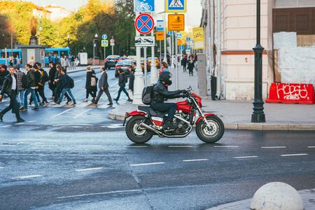 Moscow, Russia - may 25, 2017. A motorcyclist on a red Yamaha Vmax RSD bike motorcycle rides on a road near a pedestrian crossingのeditorial素材