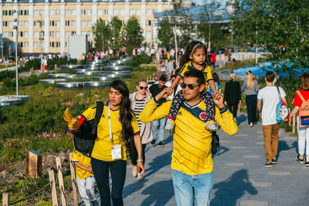 Moscow, Russia - JULY 16, 2018: Family of Colombian football fans take a walk in Zaryadye Park. FIFA World Cupのeditorial素材