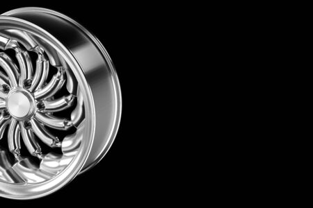Abstract chrome sports car wheel isolated on a black background 3d illustration with Copyspace for your textの写真素材
