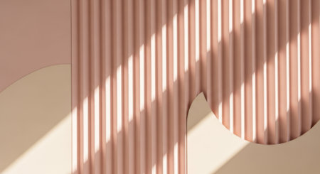 Abstract composition featuring warm light and shadow interplay on a ribbed surface.の素材