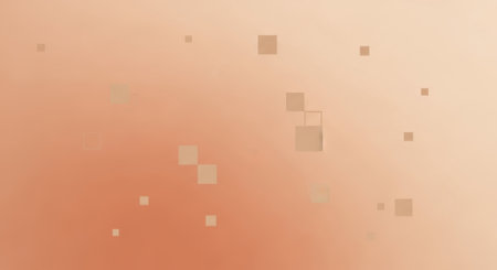 A warm, abstract gradient featuring soft speckles and a gentle illumination.の素材