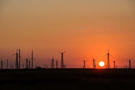 wind turbine at sunset. Crimean generating systemsの写真素材