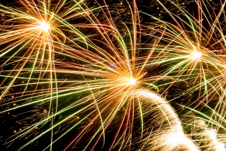 Colorful fireworks over dark skyの写真素材