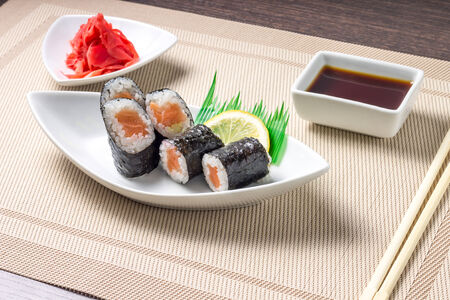 Traditional Maki sushi served with wasabi and gingerの写真素材