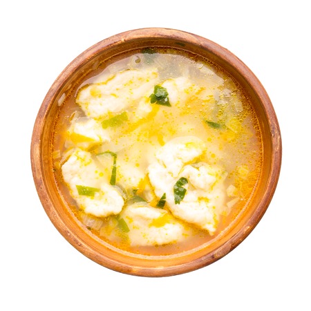 Soup with dumplings isolated on white background.  National ukrainian food. Galushky.の写真素材