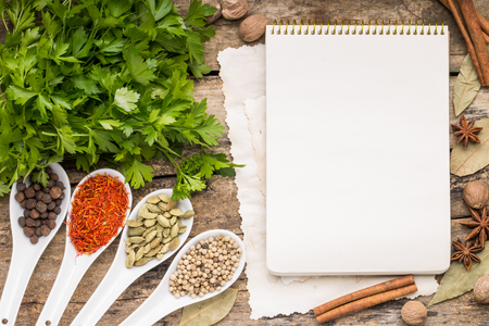 Menu background. Recipe notepad with diversity of spices and herb.の写真素材